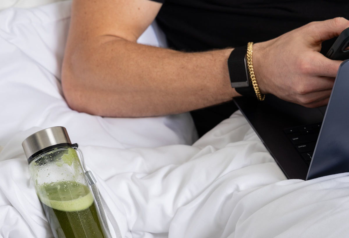Busy man with microgreens powder drink