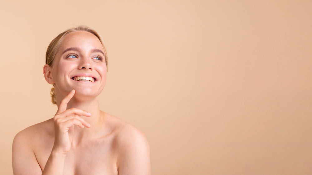 Smiling woman with hydrated skin from electrolytes