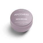 A mini tin candle in santal rock rose scent with lilac packaging 