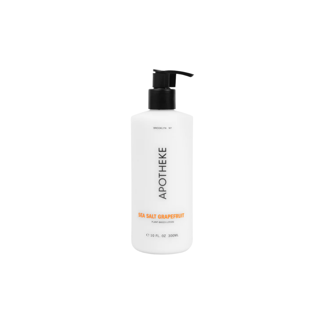 A bottle of Apotheke plant-based lotion, labeled 'WHITE VETIVER' 