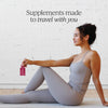 Cymbiotika Liposomal Vitamin B12 B6 lifestyle ad - woman in yoga pose holding pink supplement pouch with text Supplements made to travel with you on white brick background