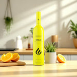 DUOLIFE Vita C bottle displayed on kitchen counter surrounded by fresh oranges and green plants, emphasizing natural vitamin C sources and wellness