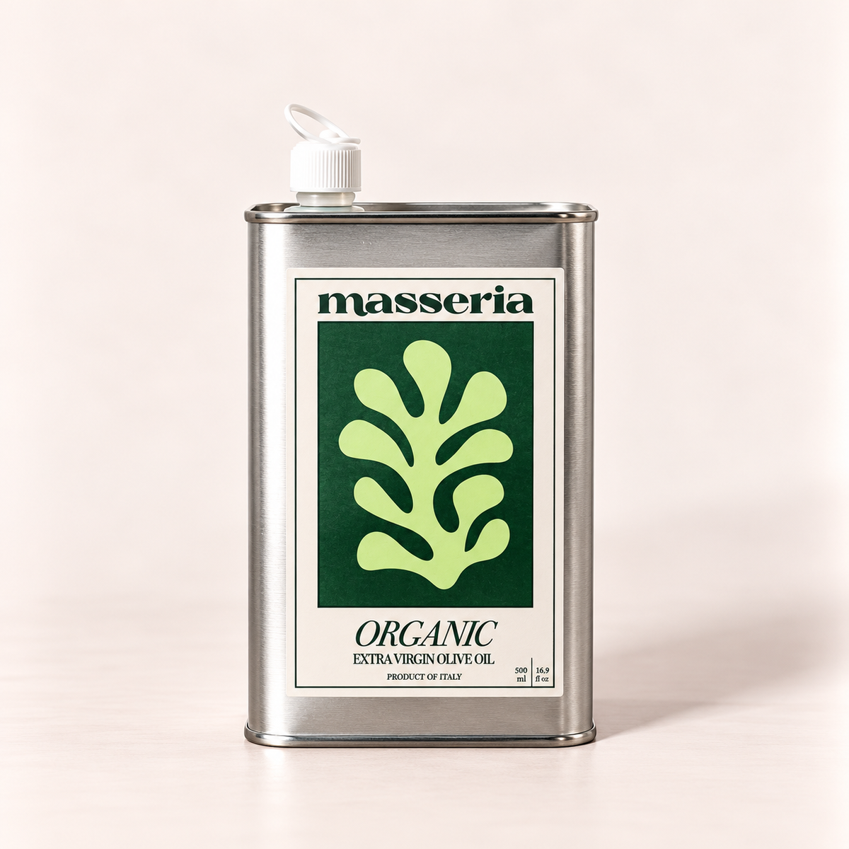 A rectangular metal can of Masseria Organic Extra Virgin Olive Oil with a white spout cap, featuring a green and white label, set against a solid light beige background.