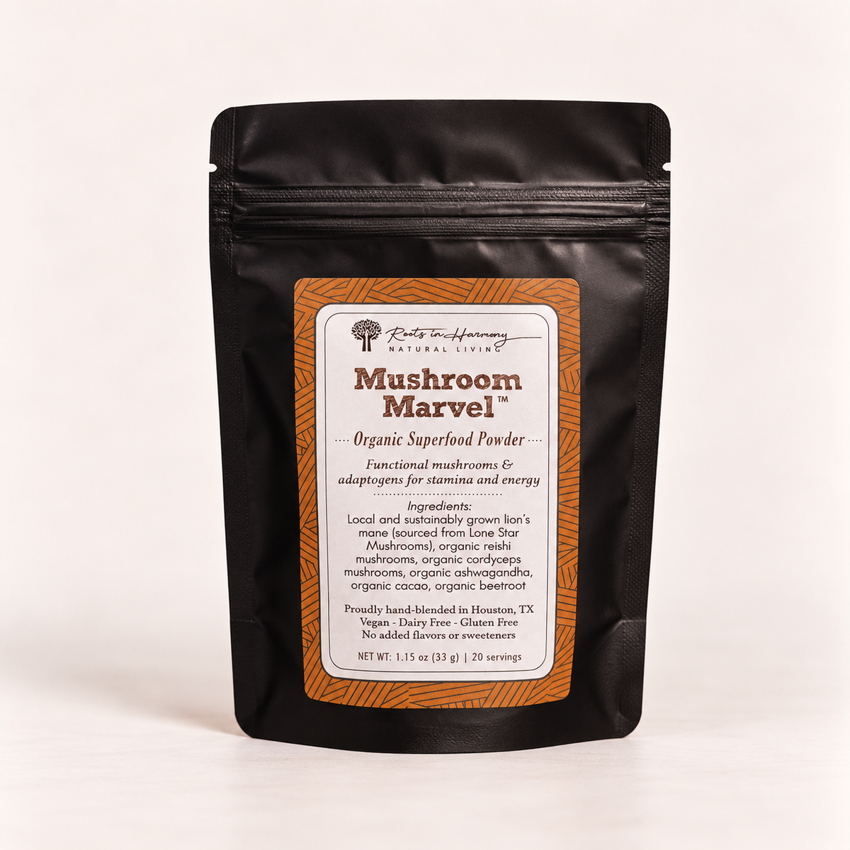 A black stand-up pouch of Mushroom Farming Natural Living Mushroom Marvel Organic Superfood Powder with a brown and white label, set against a plain off-white background.