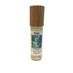 Pohala Oil of Haumea The Makalei roll-on oil bottle with bamboo wooden cap and Earth graphic label on white background