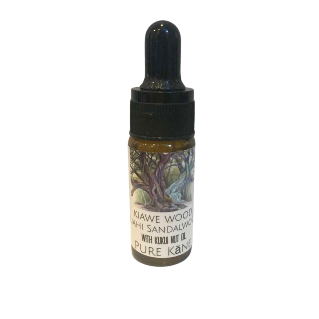 Pohala Kane Kiawe Wood Iliahi Sandalwood oil dropper bottle with illustrated tree label, with Kukui Nut Oil, Pure Kane formula on white background