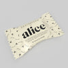 Alice Mushroom Brainstorm single chocolate bite in individual packaging, designed for on-the-go focus and cognitive support