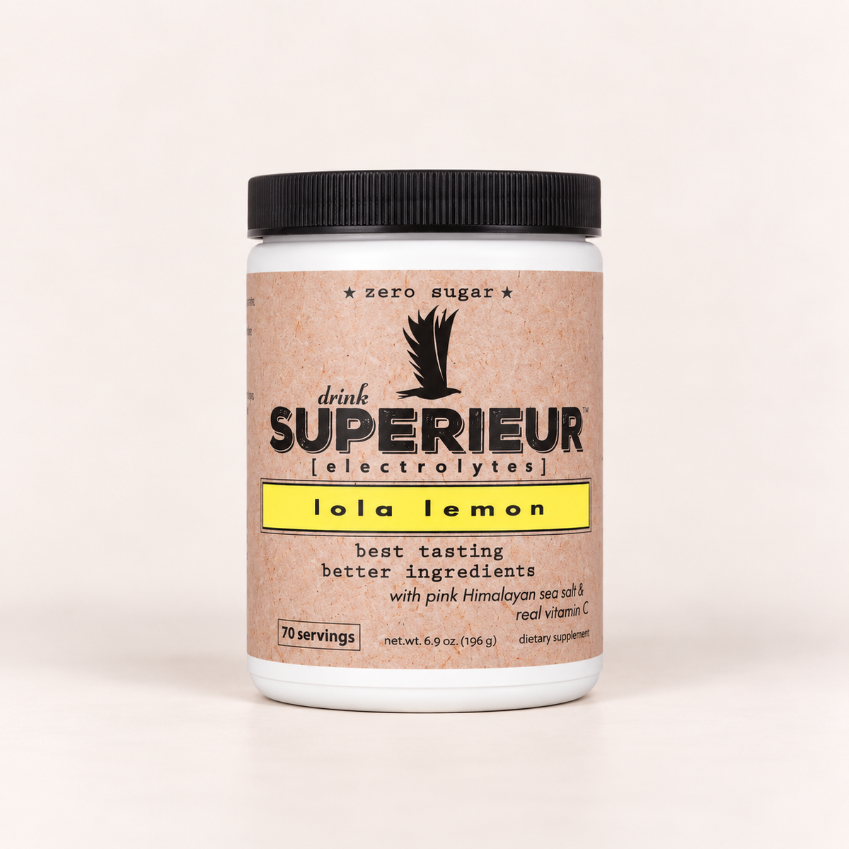 A white plastic jar of drink SUPERIEUR electrolytes in lola lemon flavor, featuring a kraft-paper style label with a black lid, on a clean off-white background.